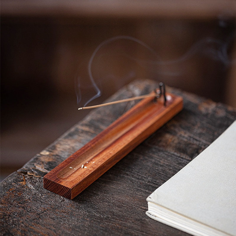 Wooden lever incense base