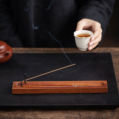 Wooden lever incense base